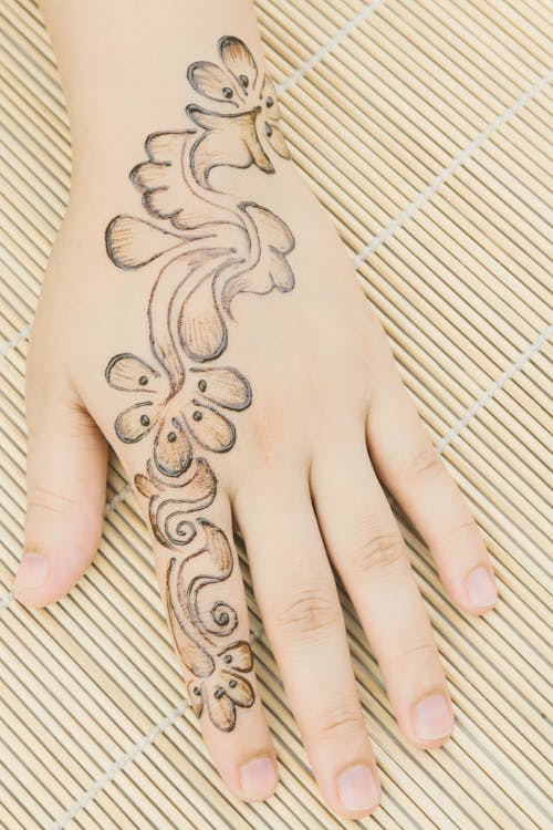 Kostenloses Stock Foto zu hand, hände menschliche hände, henna-tatoo