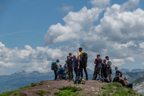 Group of People in a Mountain Valley 