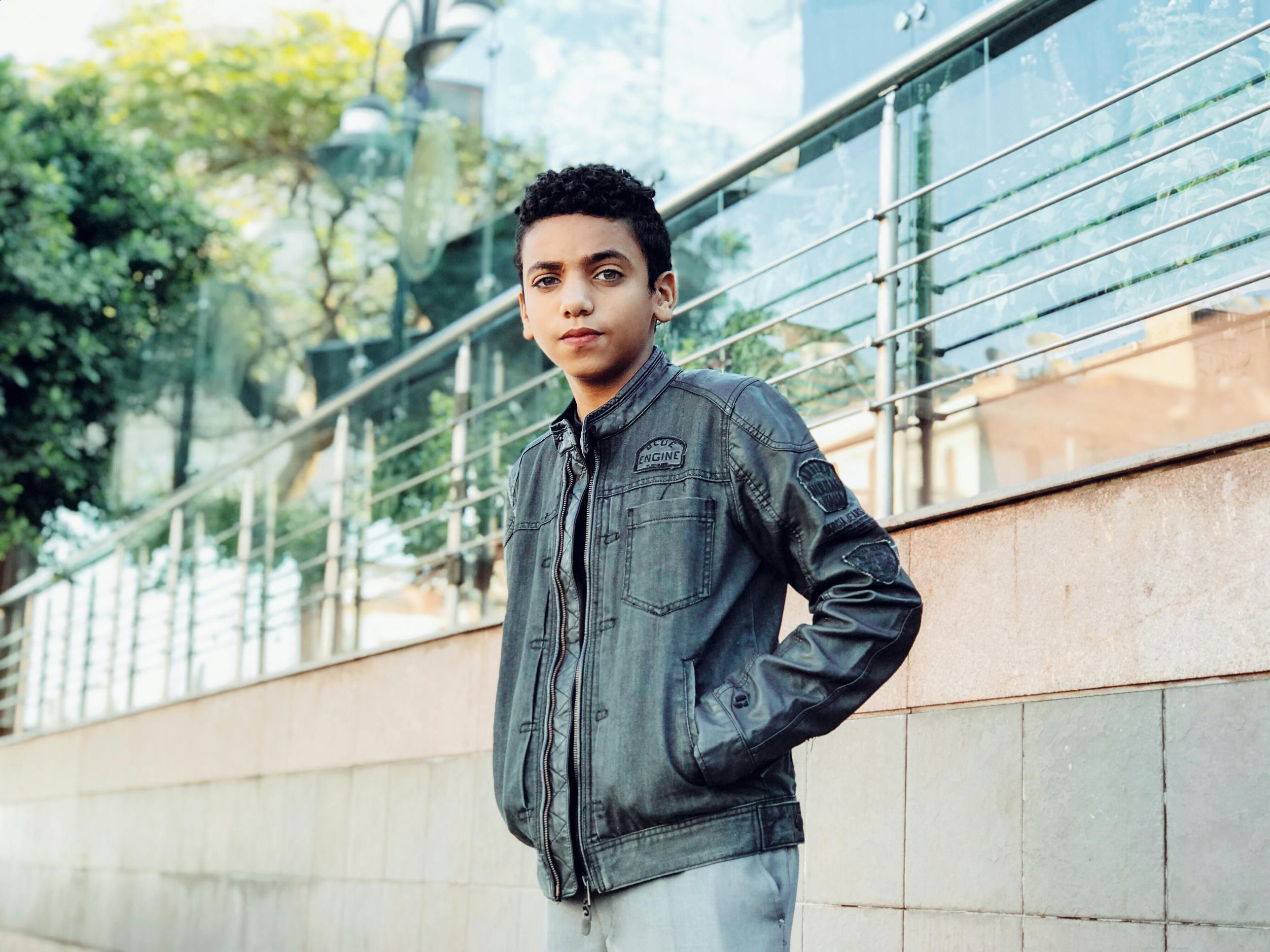 photo of boy wearing jacket