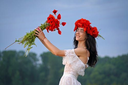 Free stock photo of happy smiling, red flowers, wedding dress