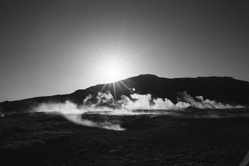 Silhouette Photography of Mountain With Mist