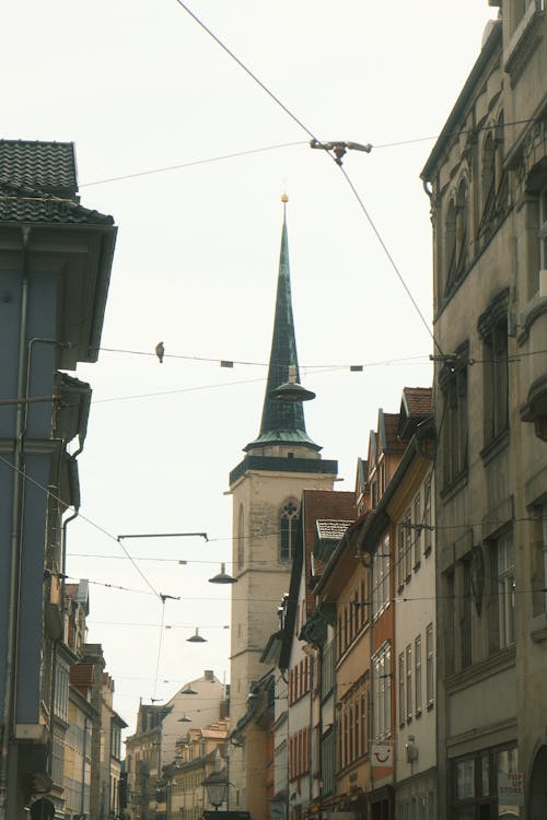 Church Tower behind Buildings in Old Town