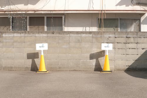 Cones near Wall and Building behind