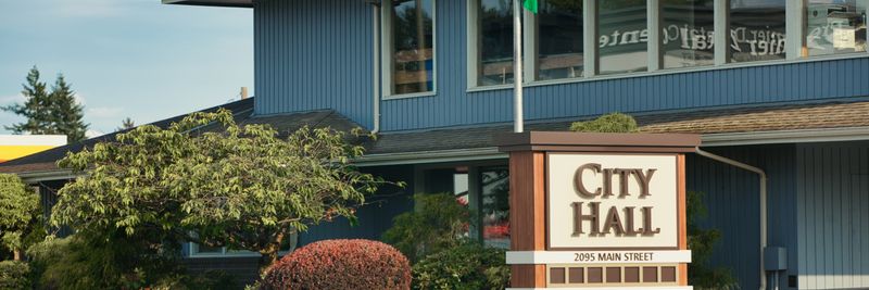 View of Ferndale City Hall on Main Street, showcasing its architectural design and surrounding landscape.