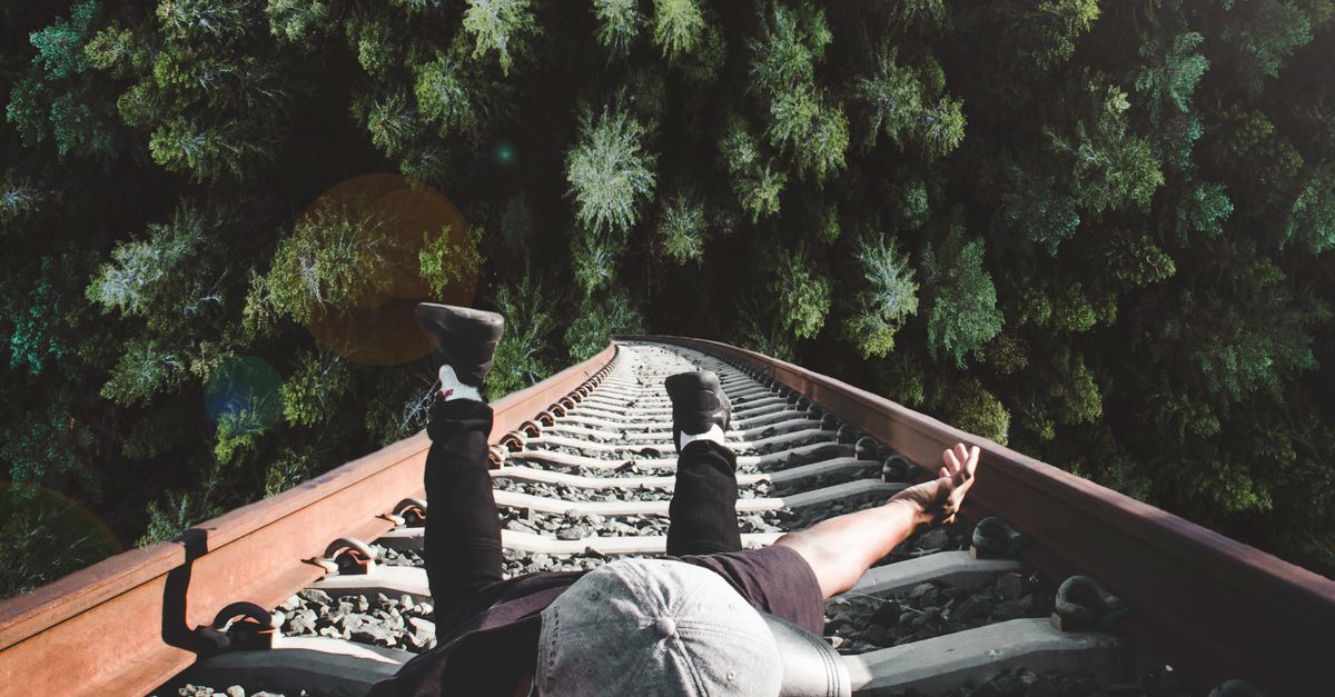 Guy Railing Man Holding on Gray Railing · Free Stock Photo