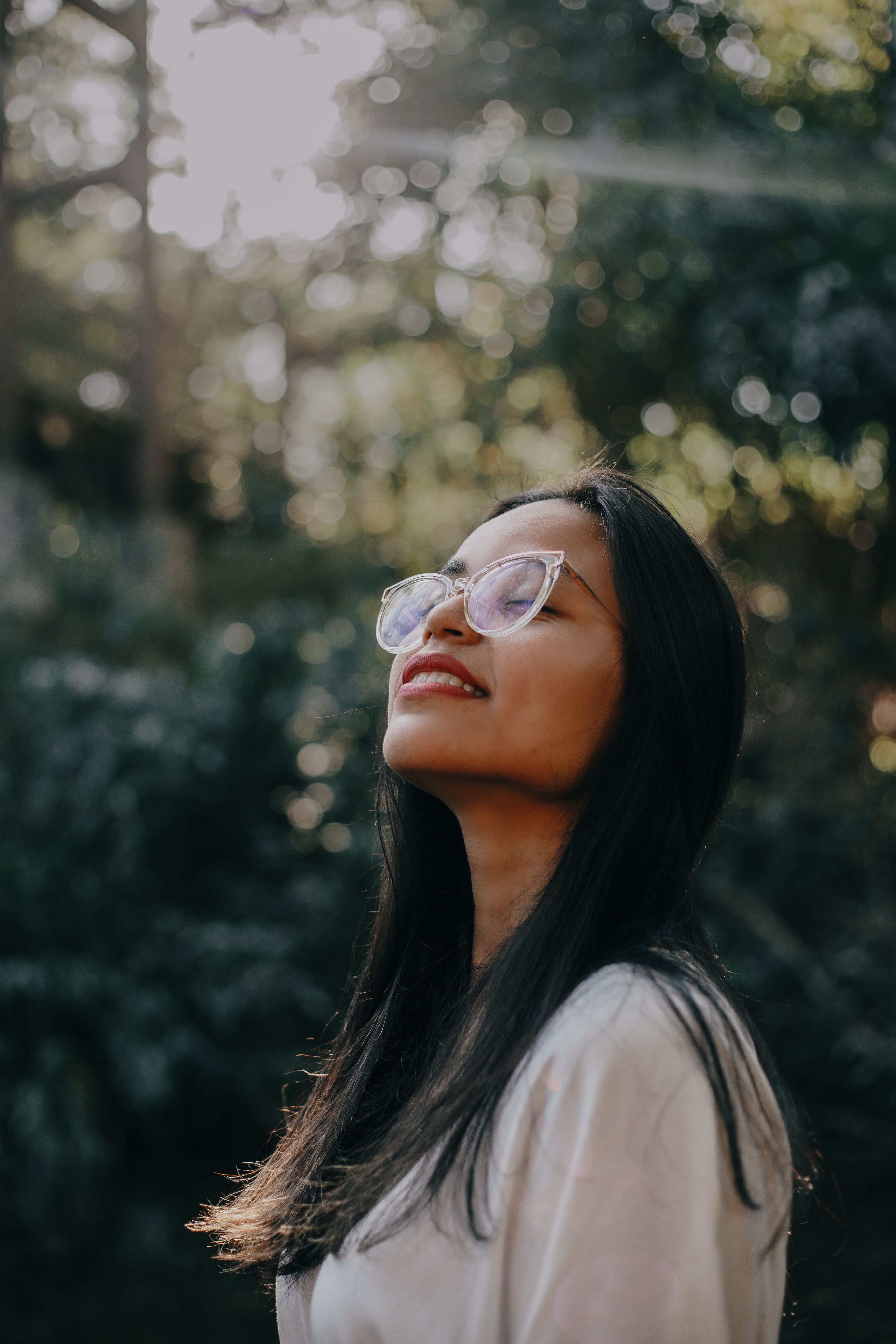 laughing health benefits — Woman Smiling Outside. Photo: Pexels