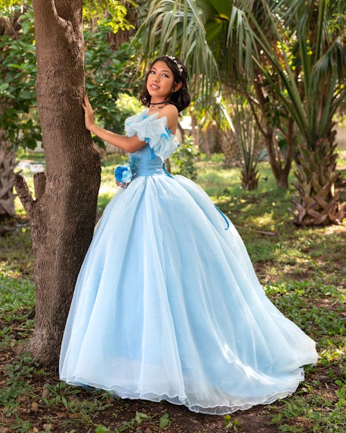 Woman Wearing Blue Dress in a Tropical Forest 