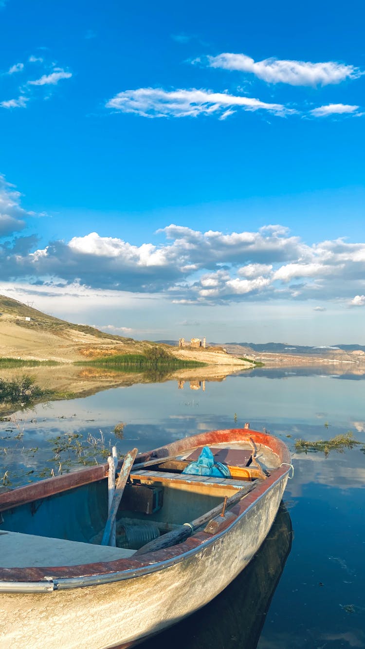 Empty Boat On River