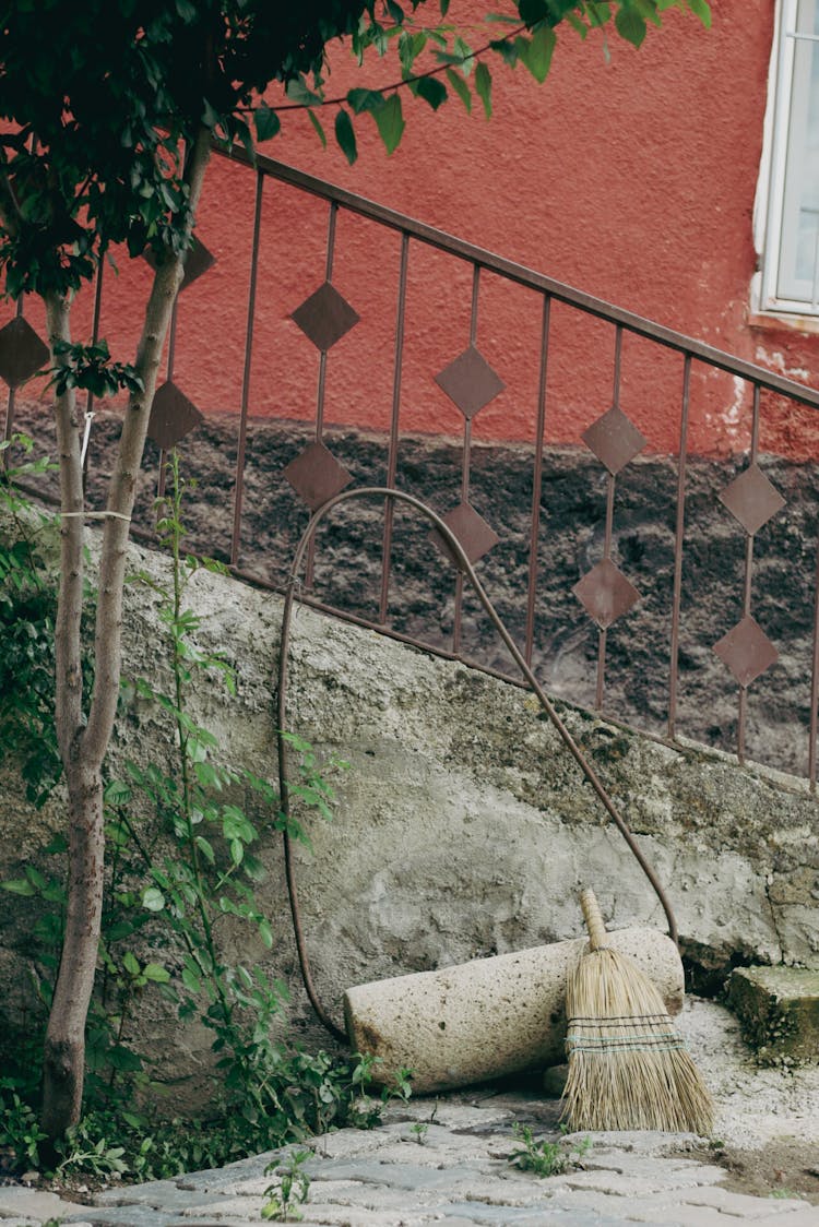 Broom Under Stone Stairs