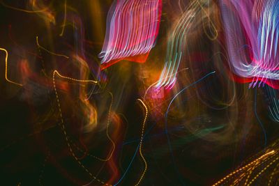 A dynamic and colorful abstract pattern created by blurred light trail — Photo by Marcelo Chagas on Pexels