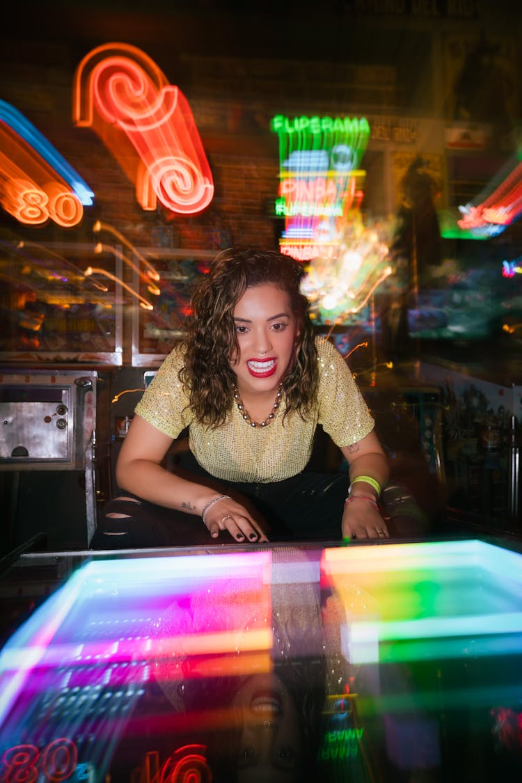 Woman Playing Game In Bar