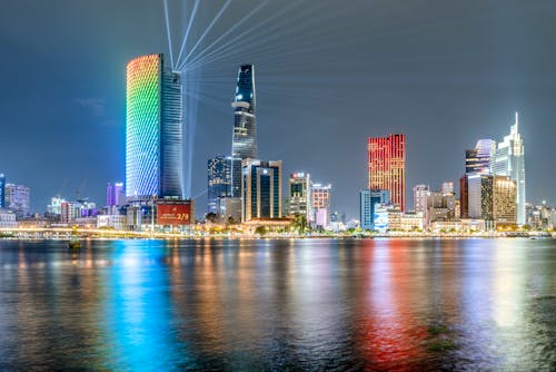 Illuminated Bitexco Financial Tower and Skyscrapers in Ho Chi Minh