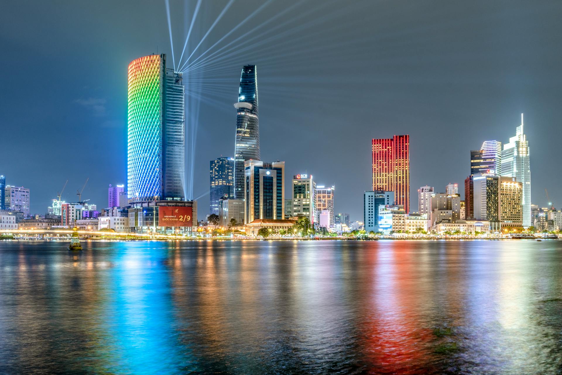 Illuminated Bitexco Financial Tower and Skyscrapers in Ho Chi Minh