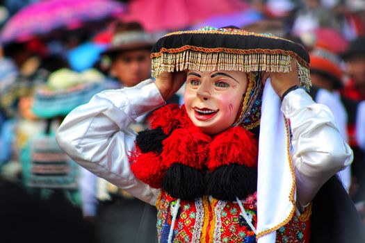 A festive street parade showcasing vibrant traditional costumes and cultural masks.