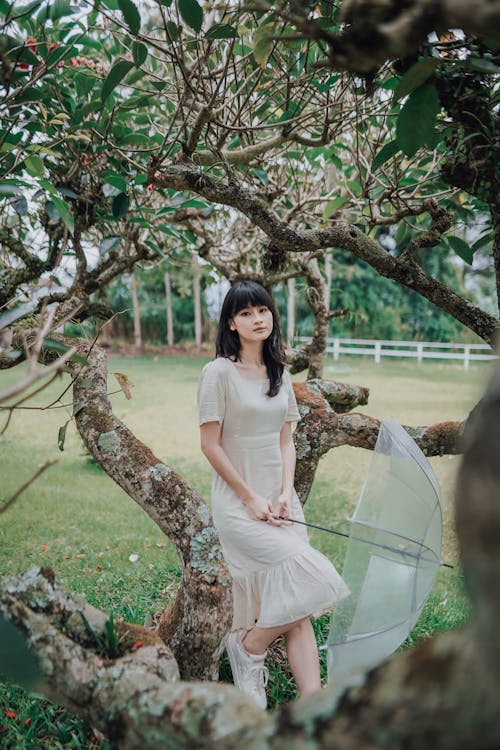 A Woman In A White Transparent Top Without Bra Stock Photo