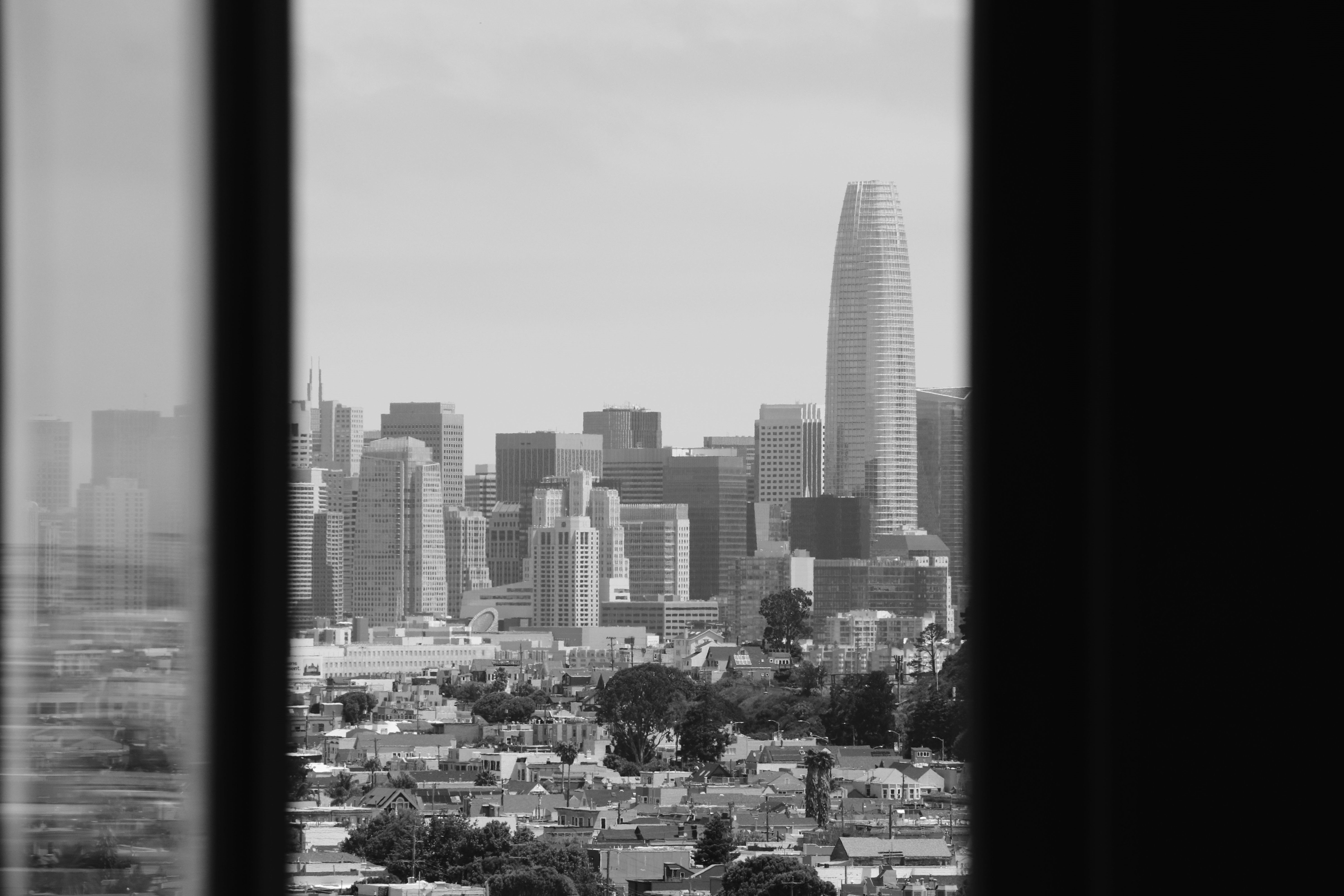 A black and white image of San Francisco's modern skyline featuring the Salesforce Tower.