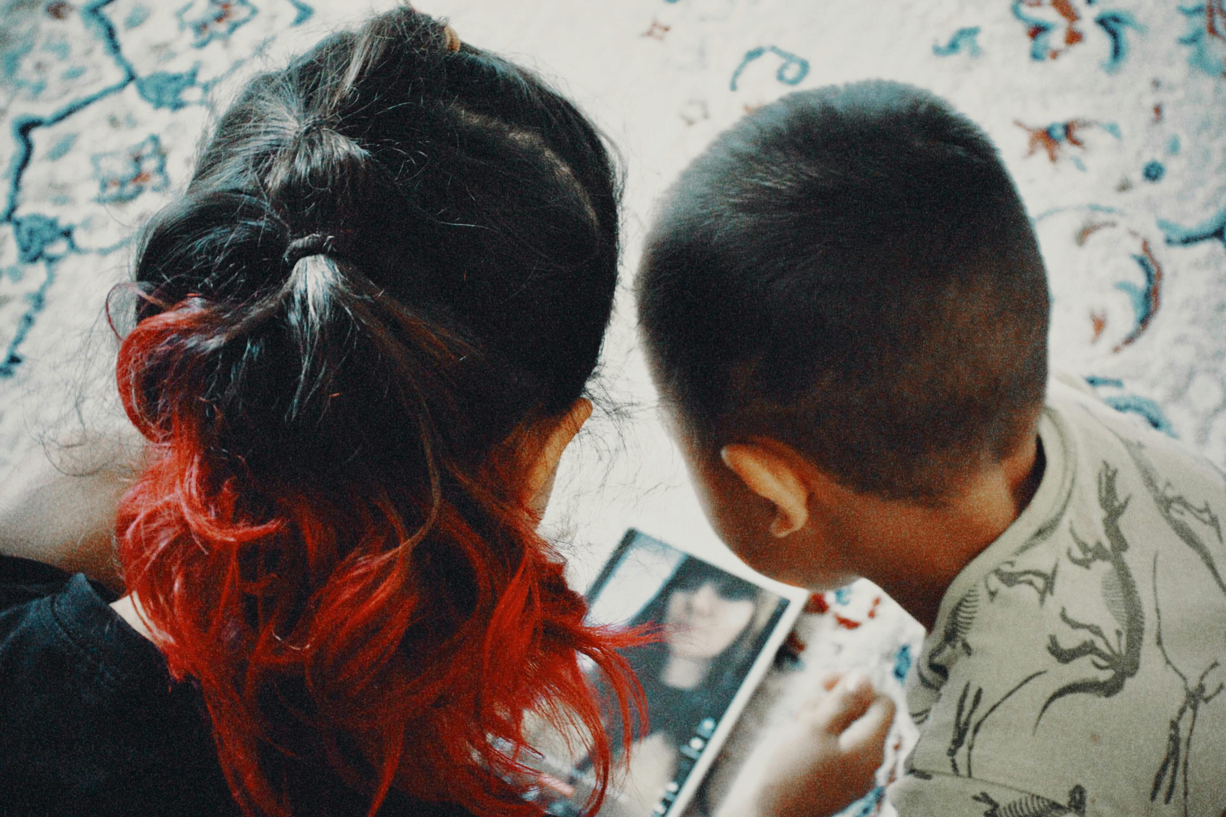 children watching movie on a tablet