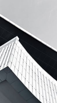 Low angle shot of a modern building facade in İstanbul, emphasizing geometric patterns and urban architecture.