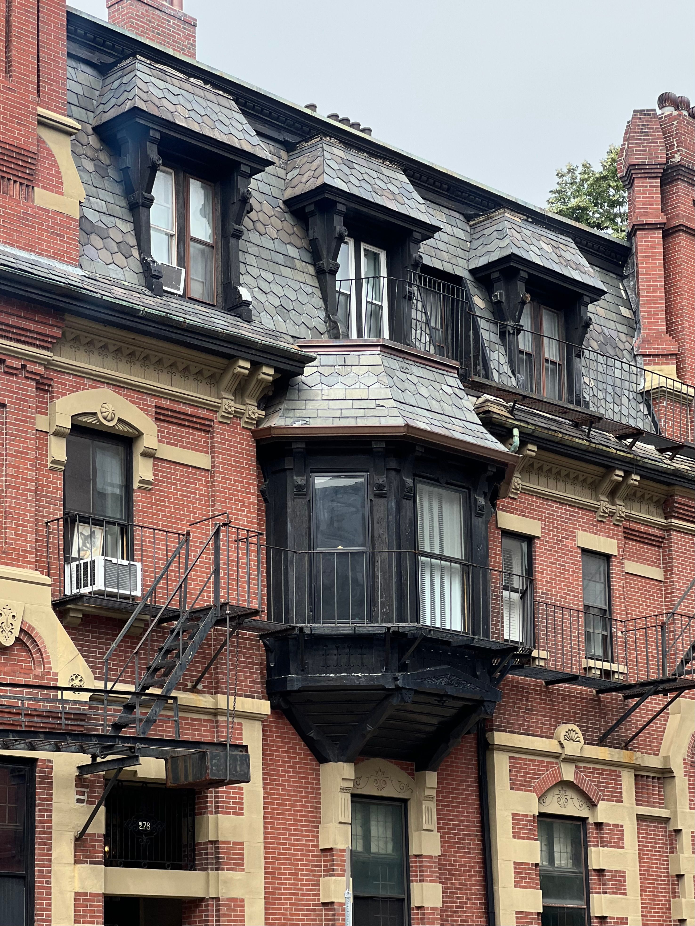 Explore the elegant architecture of a historic brick building in Boston's Back Bay.