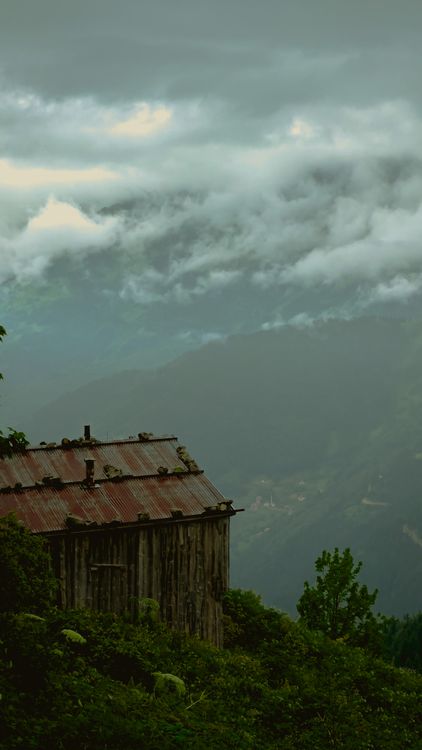 An Old Wooden Cabin in Mountains · Free Stock Photo