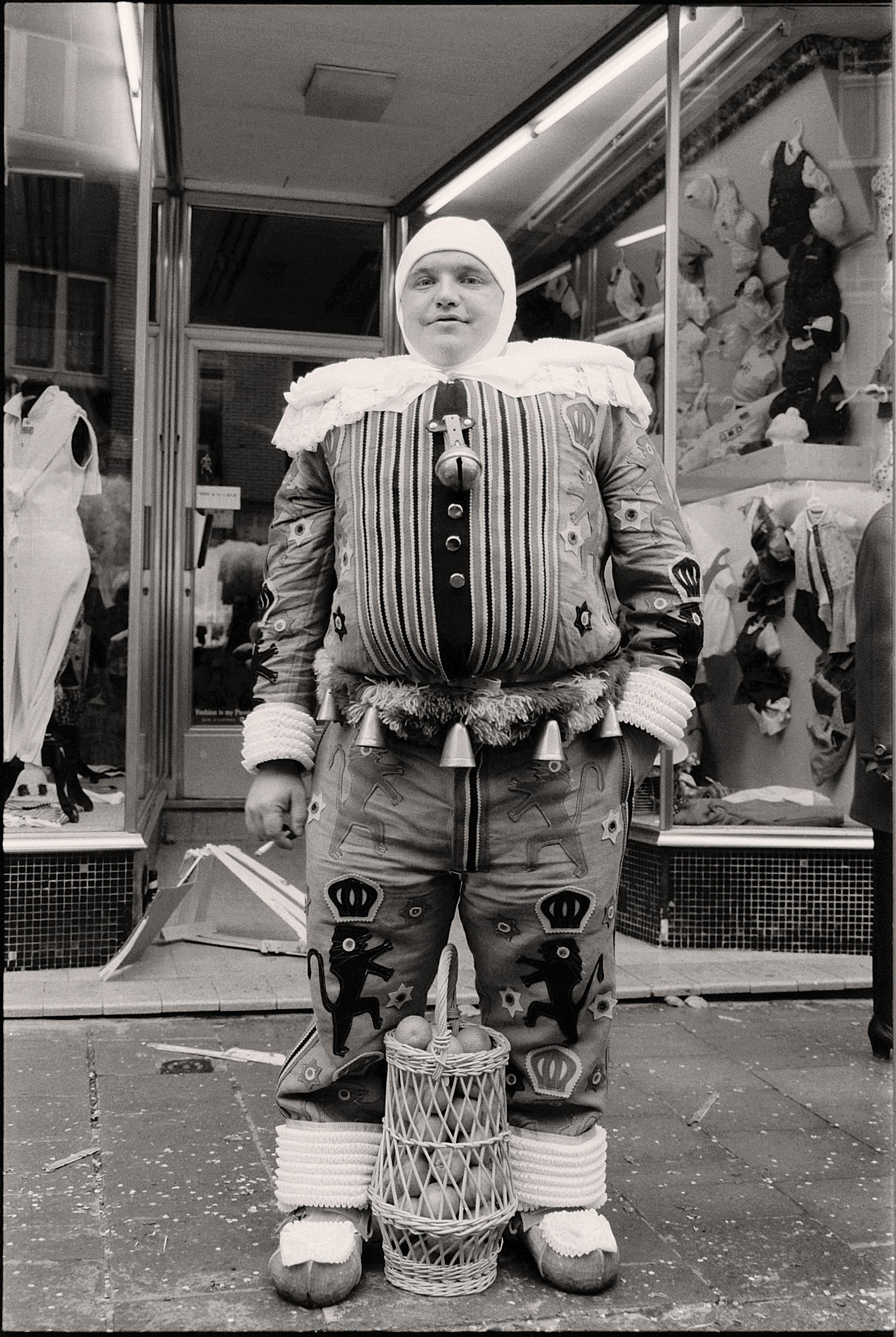 An Old Photograph of a Man in a Costume on the Street · Free Stock Photo