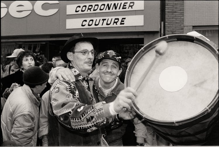 Men Playing Drum On Parade