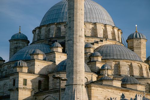 Free Beautiful view of the famous Blue Mosque's detailed architecture under clear skies in Istanbul. Stock Photo
