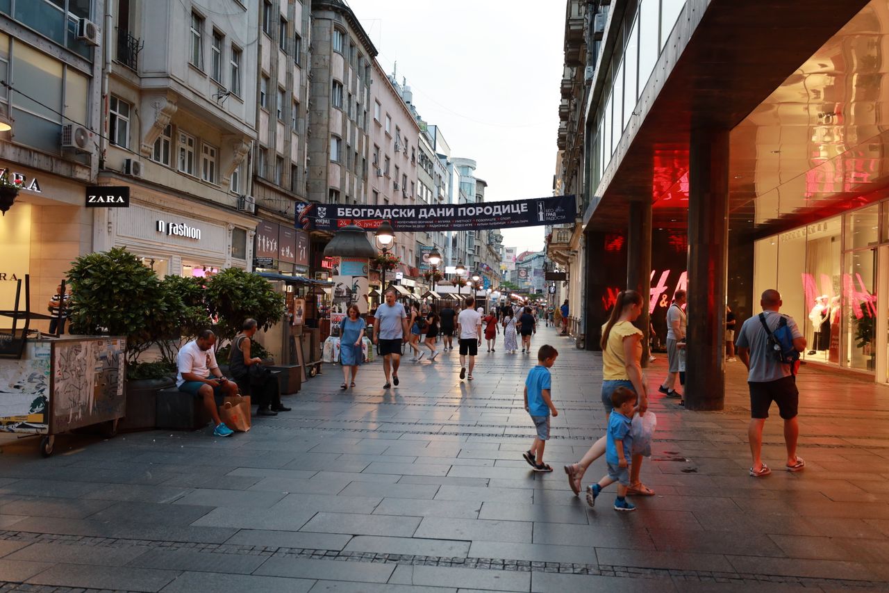 lively scene with shops and pedestrians on knez mihailova street in be