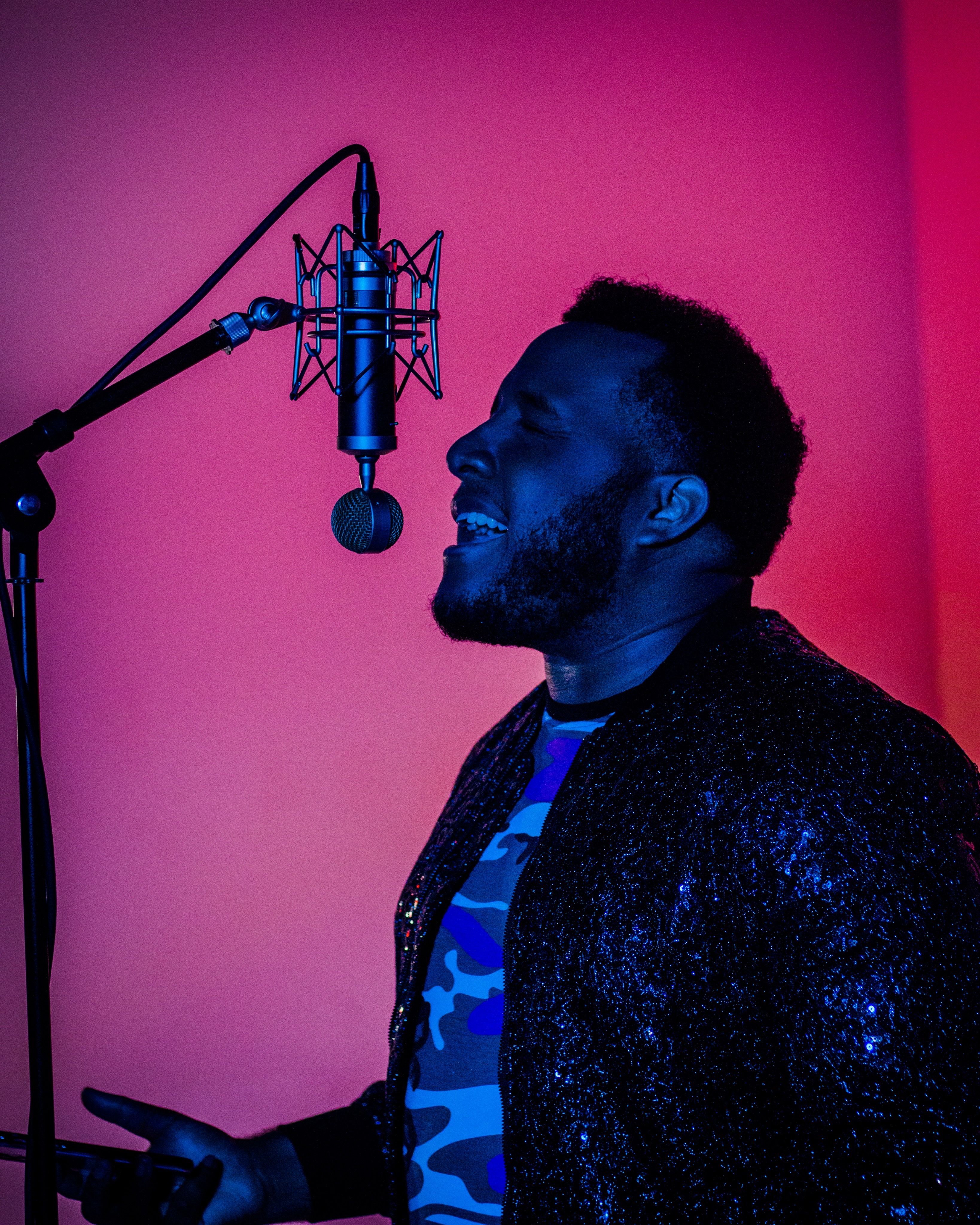 Singer on Red Background · Free Stock Photo