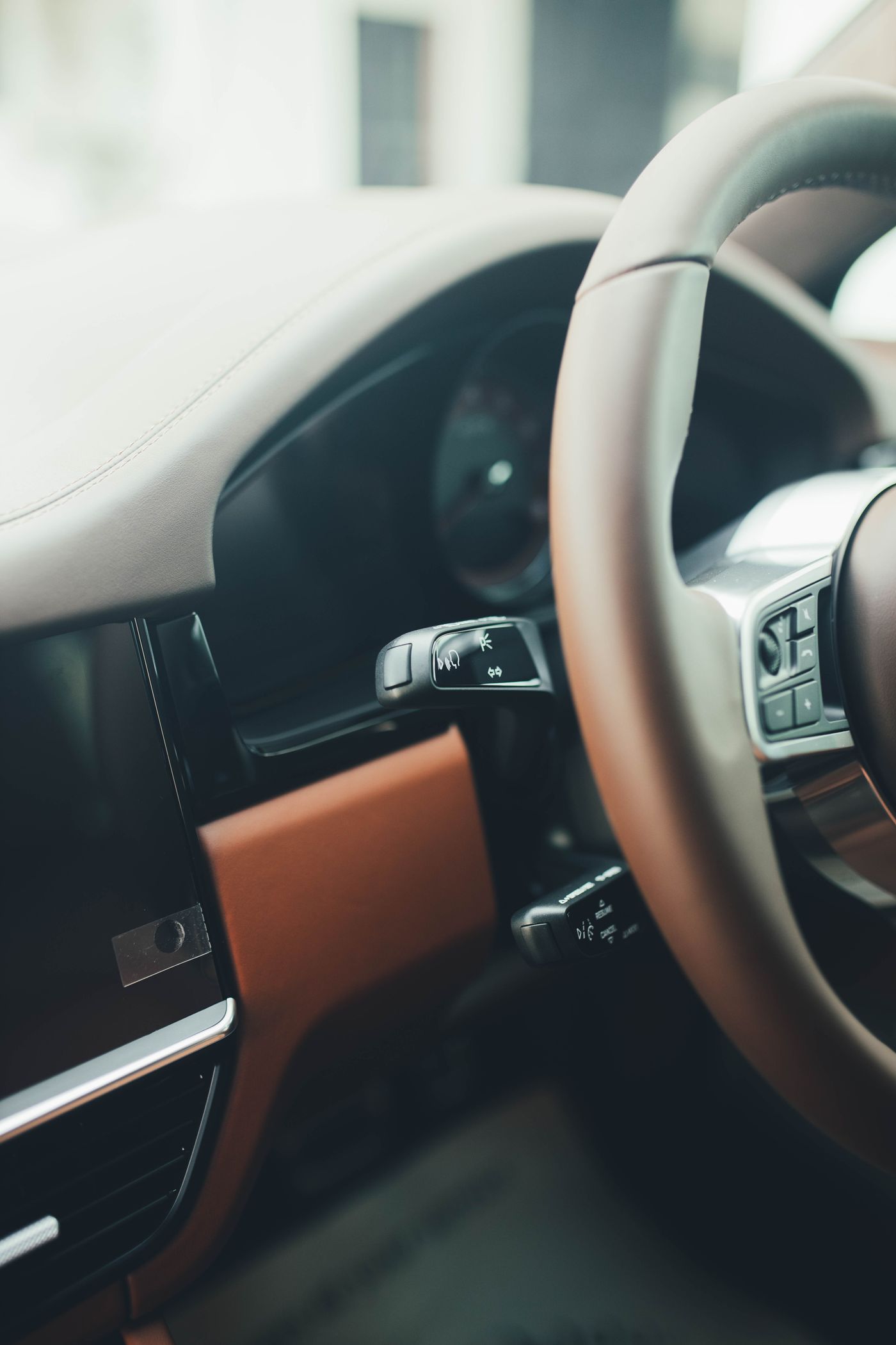 Clean premium dashboard and steering wheel inside a modern vehicle