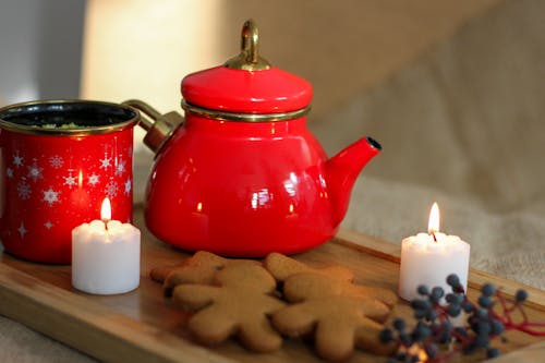Kettle, Cup, Wax Candles and Cookies