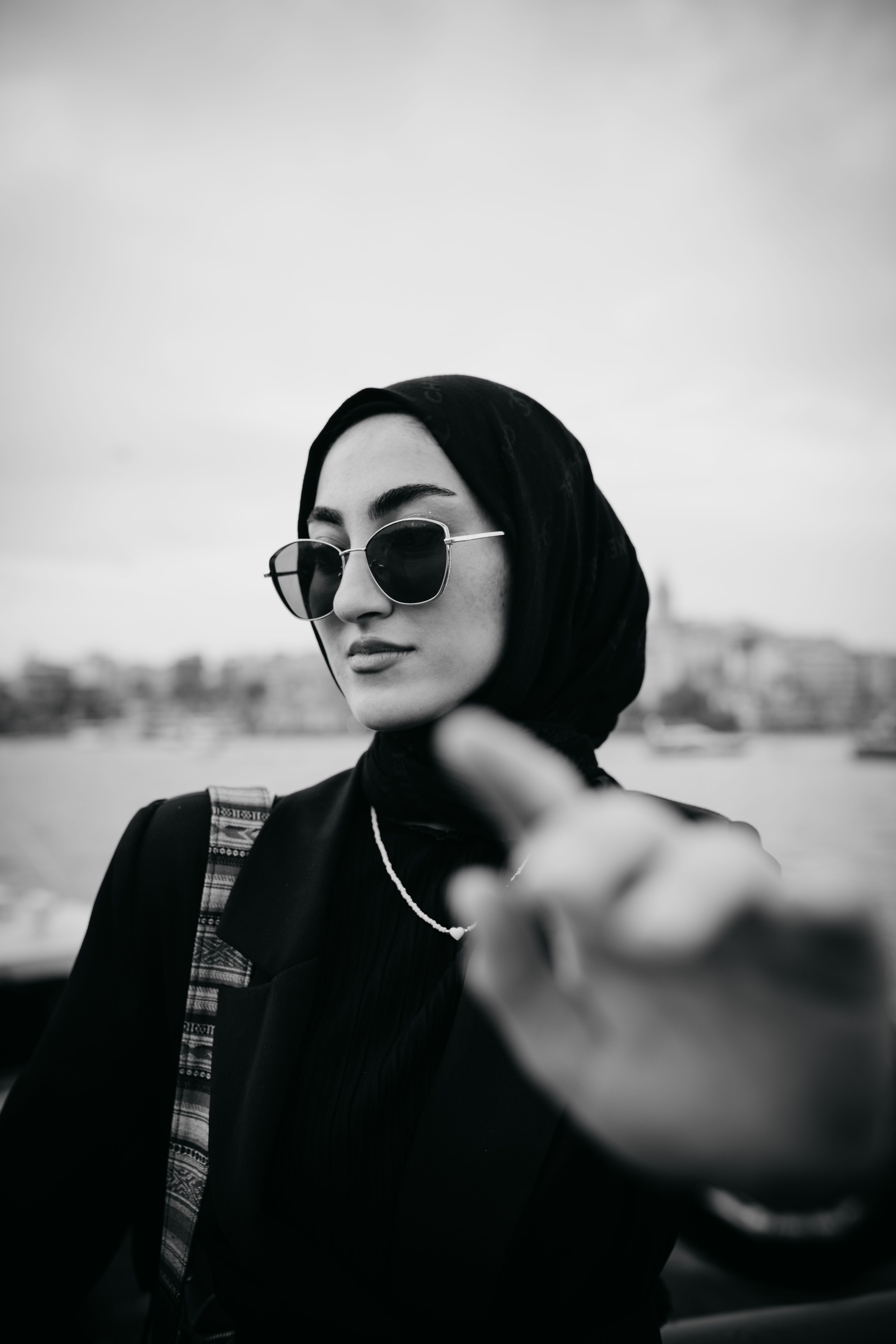 Woman in Hijab and Sunglasses in Black and White · Free Stock Photo