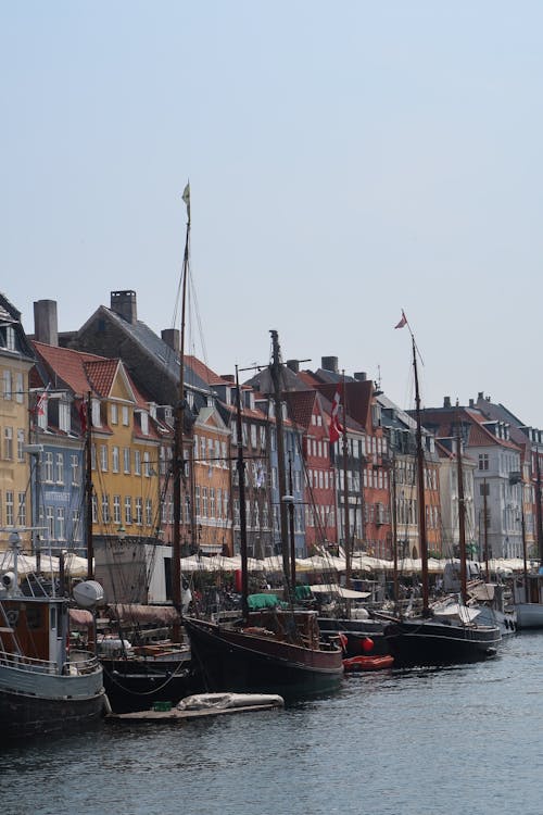Colourful Facade and Boats along the Nyhavn Canal in Copenhagen, Denmark