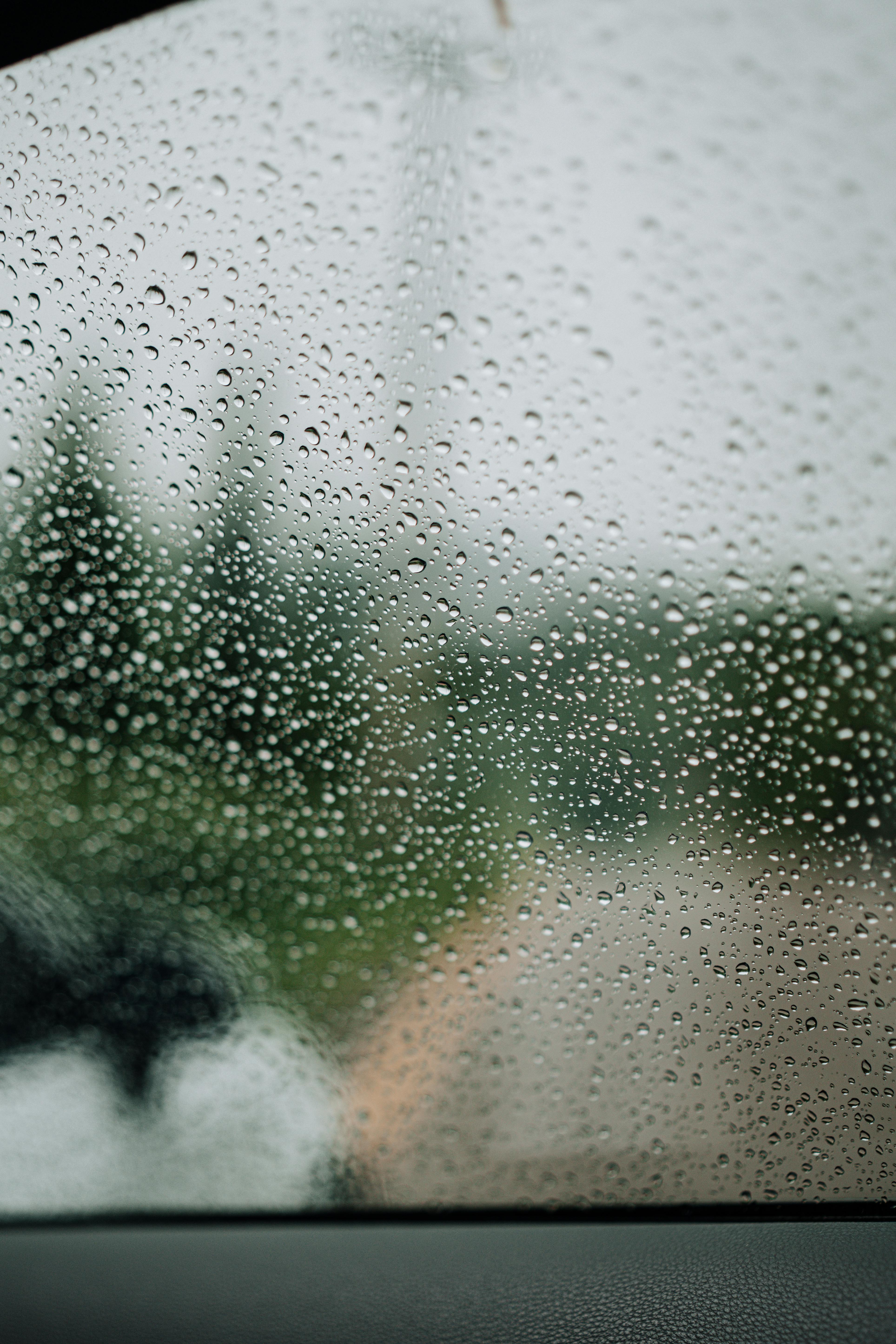 Closeup of a Window during Rain · Free Stock Photo
