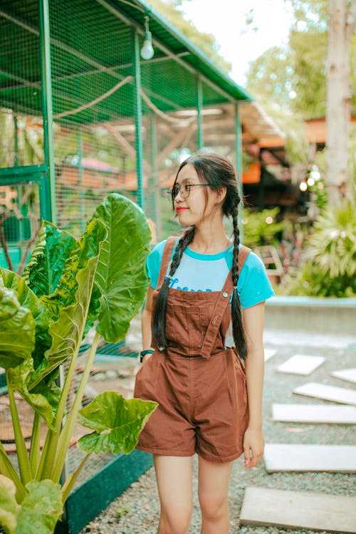 Woman in Short Dungarees