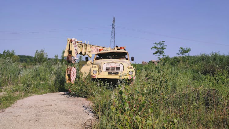 Vintage Truck With Crane In Countryside