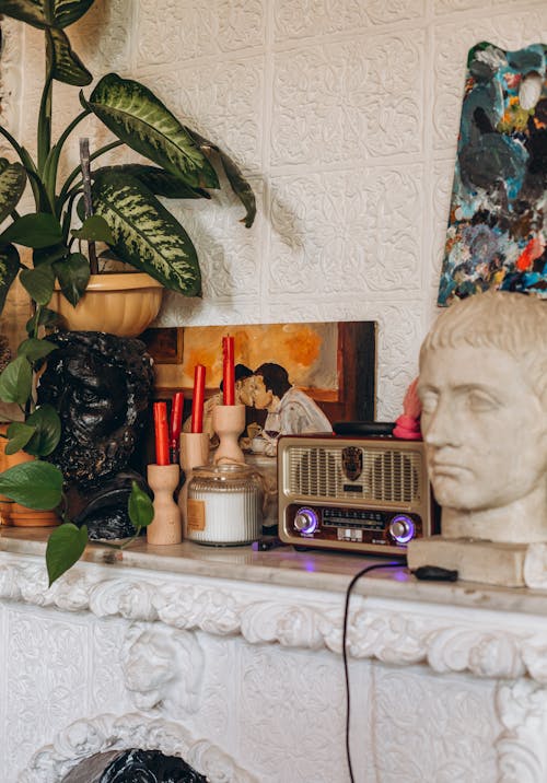 Retro Radio and Sculptures on Fireplace