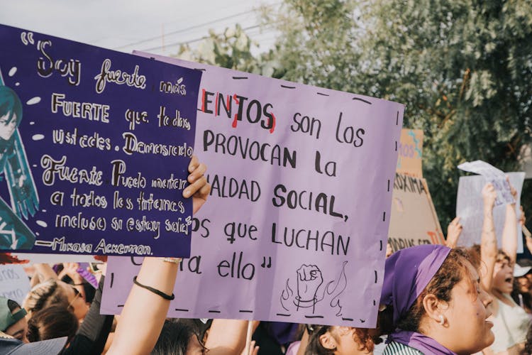 Women Holding Posters On A Street Demonstration 