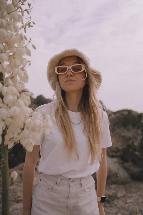 Blonde in Sunglasses and Hat