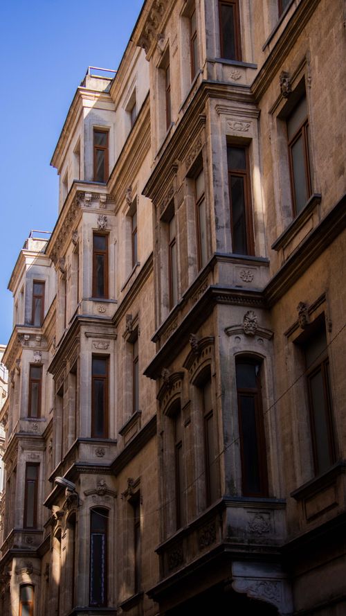 Free Discover the elegance of Ottoman architecture in a historic Istanbul residential facade. Stock Photo