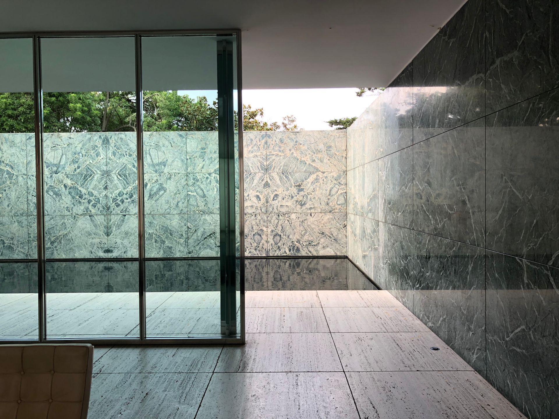 Interior view of the iconic Barcelona Pavilion, showcasing minimalist and modernist design elements.