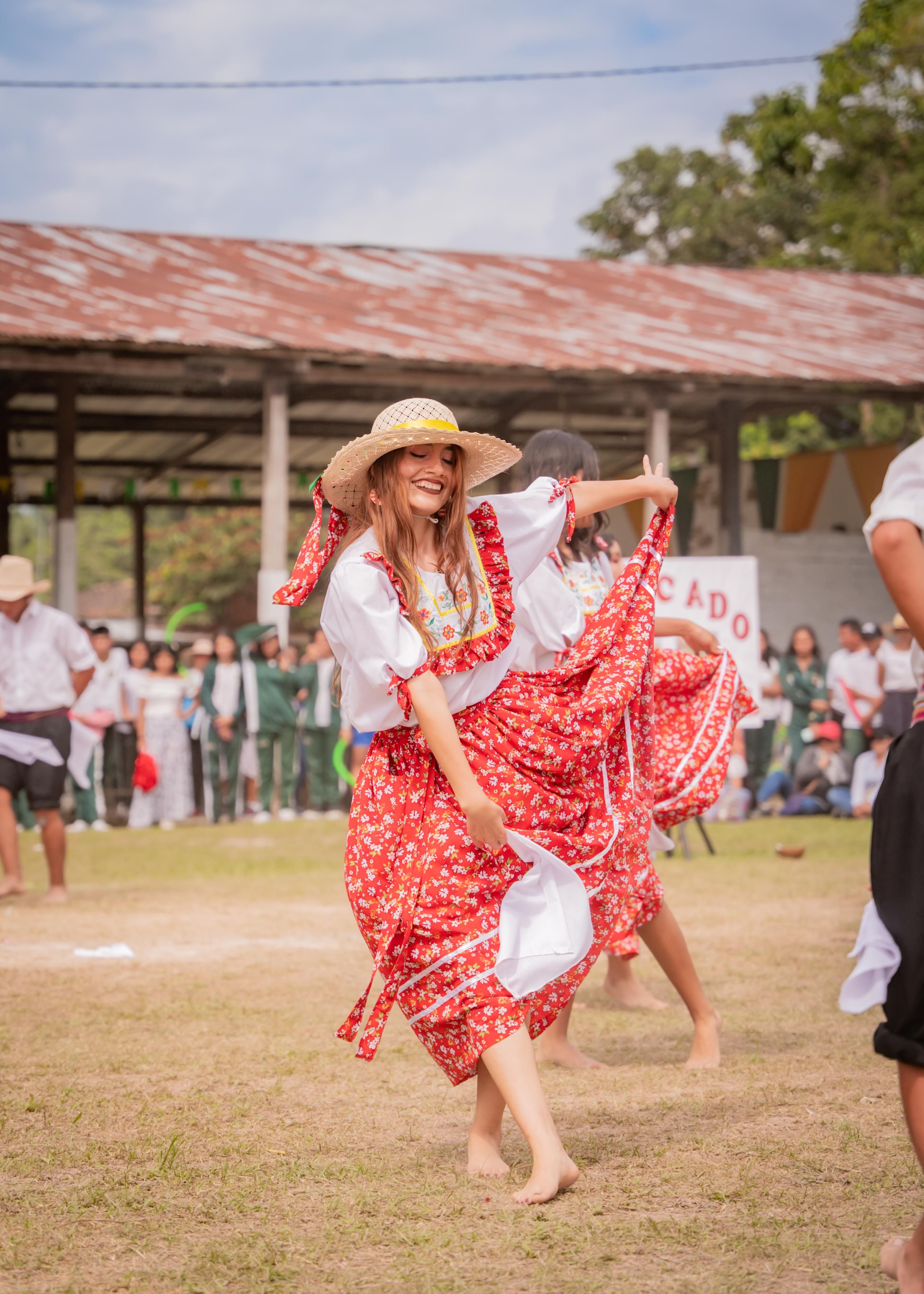 Smiling Woman Dancing in Traditional Dress · Free Stock Photo