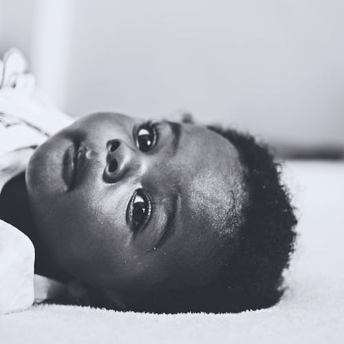 Free stock photo of baby, black and white, black background
