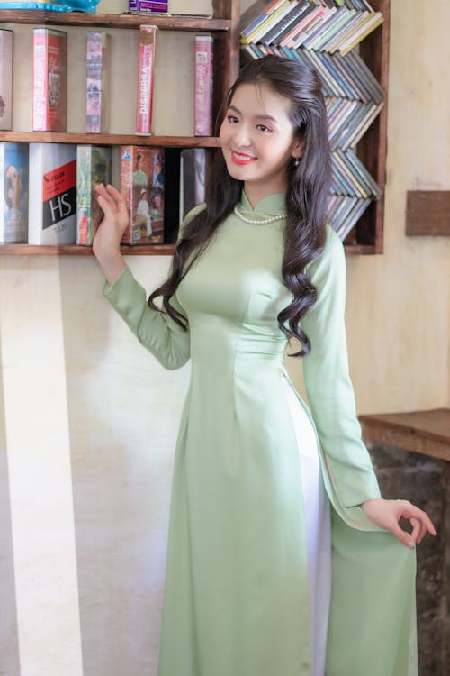 Smiling Woman in Green Dress