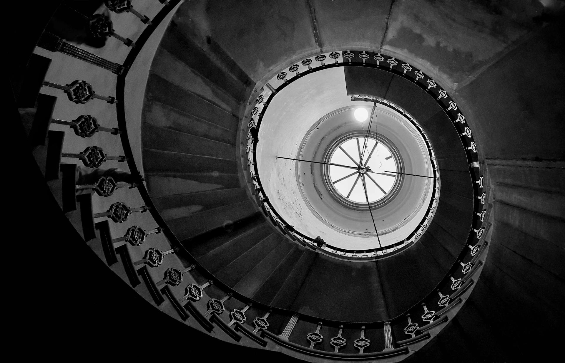 Low-Angle Photo of Spiral Stairs