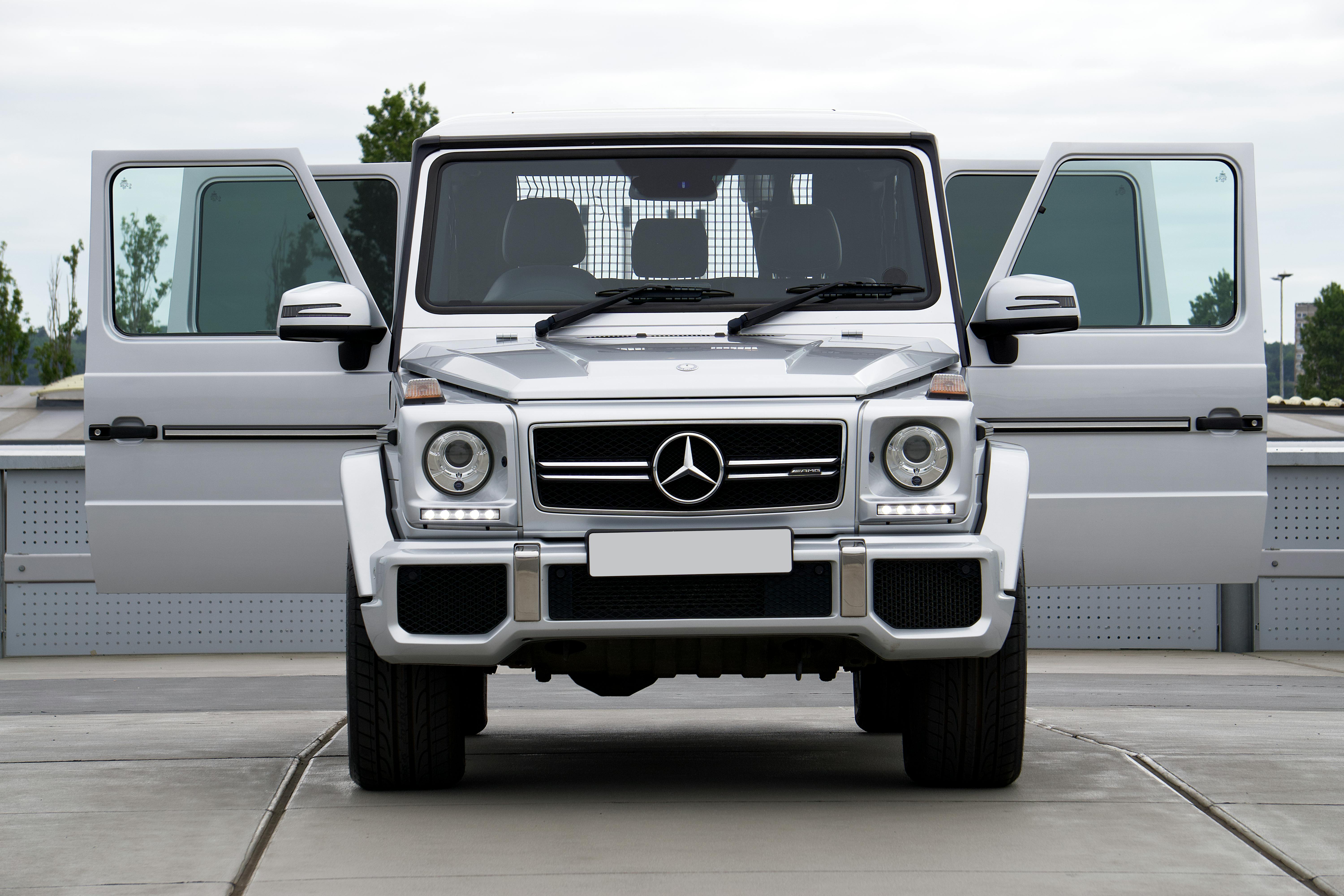 silver mercedes on a parking lot