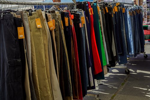 Free A rack of clothes with many different colors Stock Photo