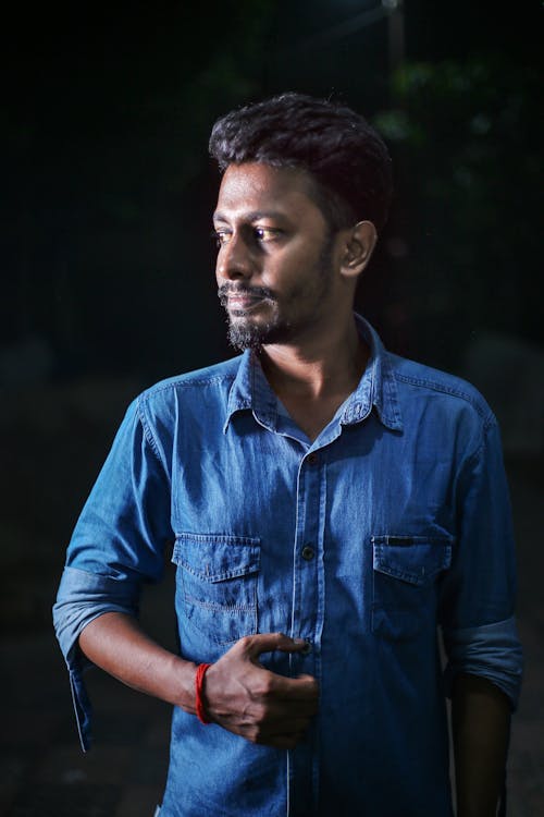 Portrait of Indian Man Wearing Denim Shirt 