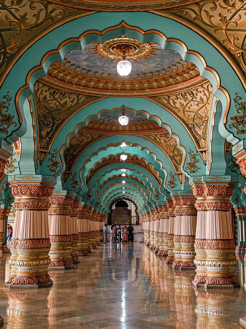 Free Elegant interior arches of the Mysore Palace showcasing traditional Indian architecture. Stock Photo