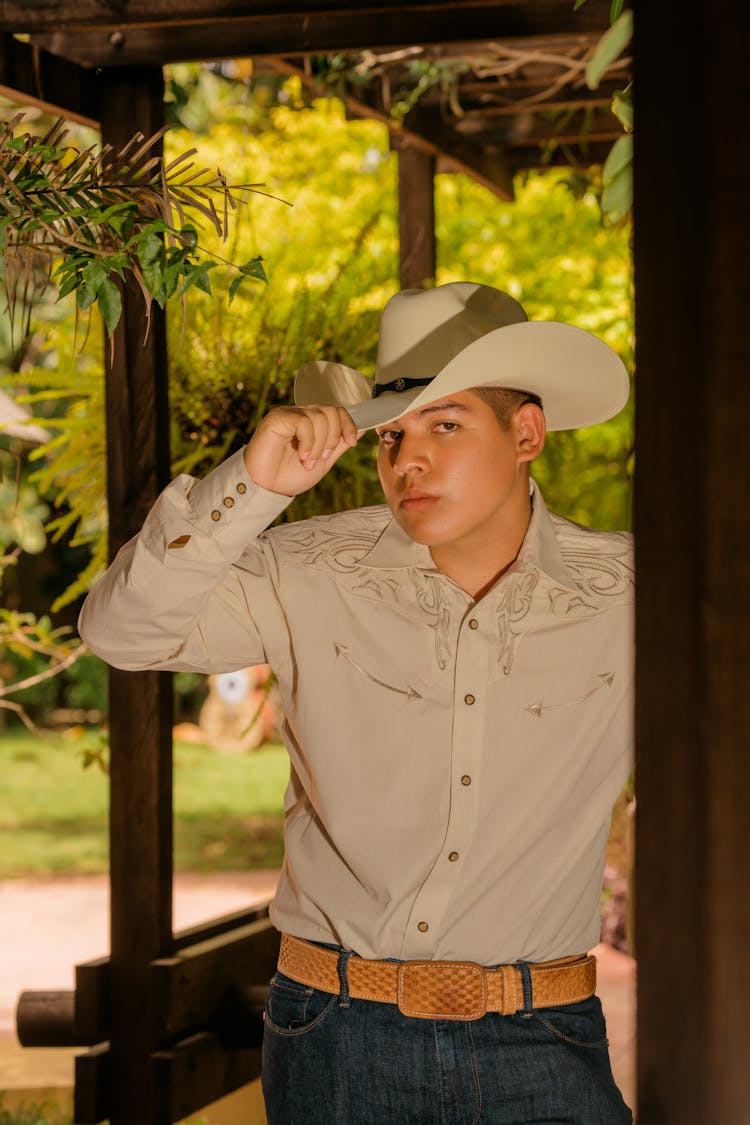 Young Man In Cowboy Hat